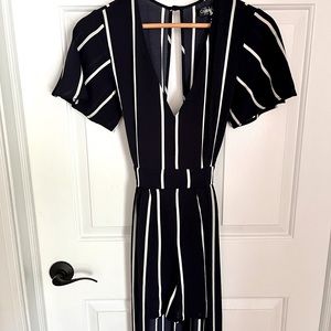 1940s style half dress, shorts, jumpsuit.